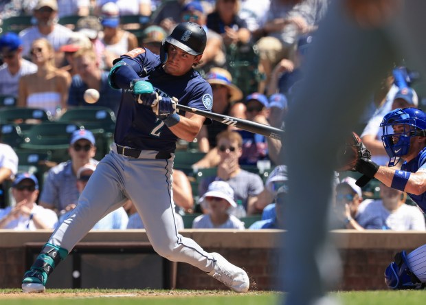 Mariners second baseman Cole Young fouls off a pitch in the fourth inning against the Cubs on June 21, 2025, at Wrigley Field. (John J. Kim/Chicago Tribune)