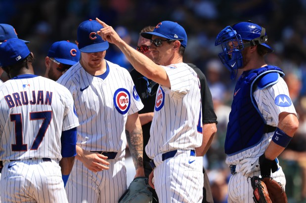 Cubs manager Craig Counsell motions to the bullpen as pitcher Cade Horton is taken out of the game in the fifth inning against the Mariners on June 21, 2025, at Wrigley Field. (John J. Kim/Chicago Tribune)