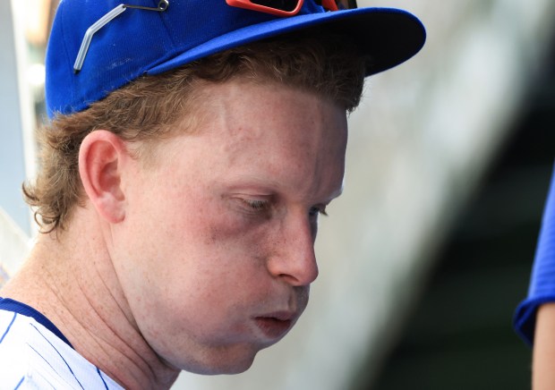 Cubs center fielder Pete Crow-Armstrong stands in the dugout during a temporary stoppage in play in the sixth inning against the Mariners on June 21, 2025, at Wrigley Field. (John J. Kim/Chicago Tribune)