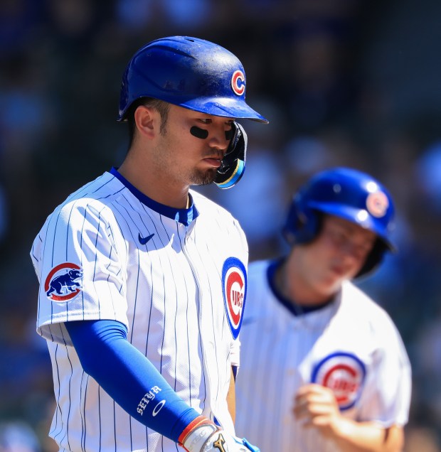 Cubs designated hitter Seiya Suzuki heads to the dugout after flying out in the sixth inning against the Mariners on June 21, 2025, at Wrigley Field. (John J. Kim/Chicago Tribune)