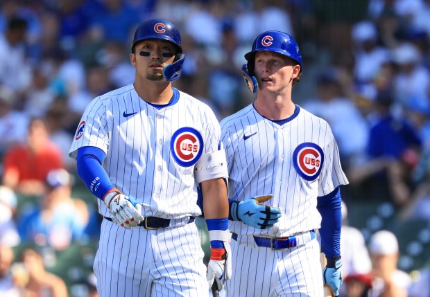 Cubs designated hitter Seiya Suzuki, left, walks to the dugout with center fielder Pete Crow-Armstrong after being called out on strikes in the eighth inning against the Mariners on June 21, 2025, at Wrigley Field. (John J. Kim/Chicago Tribune)