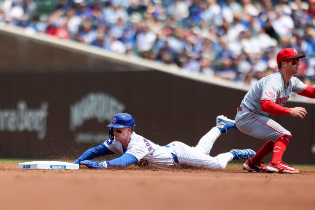 Chicago Cubs outfielder Pete Crow-Armstrong (4) steals second base during the first inning against the Cincinnati Reds at Wrigley Field on Sunday, June 1, 2025. (Eileen T. Meslar/Chicago Tribune)