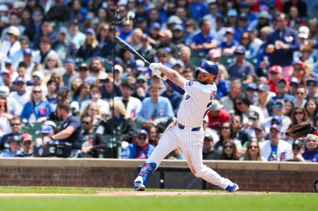 Chicago Cubs first baseman Michael Busch (29) hits a two-run home run during the third inning against the Cincinnati Reds at Wrigley Field on Sunday, June 1, 2025. (Eileen T. Meslar/Chicago Tribune)