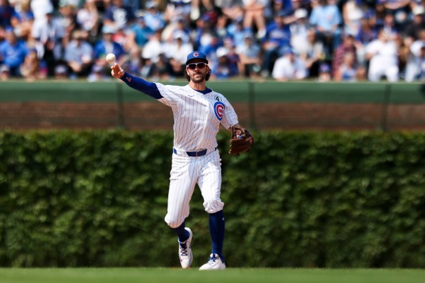 Chicago Cubs shortstop Dansby Swanson (7) throws to first base during the sixth inning against the Cincinnati Reds at Wrigley Field on Sunday, June 1, 2025. (Eileen T. Meslar/Chicago Tribune)