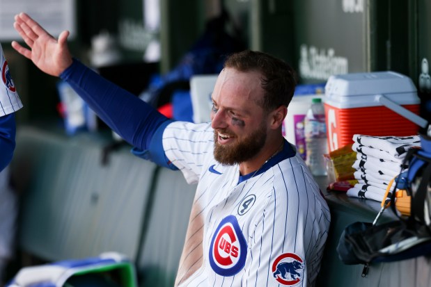 Chicago Cubs first baseman Michael Busch (29) celebrates in the dugout after hitting a two-run home run during the third inning against the Cincinnati Reds at Wrigley Field on Sunday, June 1, 2025. (Eileen T. Meslar/Chicago Tribune)