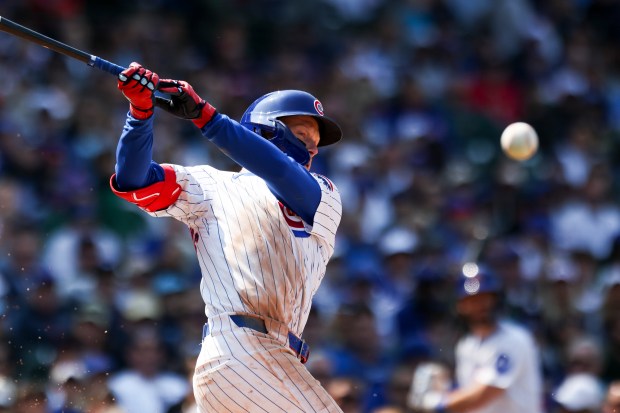 Chicago Cubs outfielder Pete Crow-Armstrong (4) hits a foul ball during the seventh inning against the Cincinnati Reds at Wrigley Field on Sunday, June 1, 2025. (Eileen T. Meslar/Chicago Tribune)