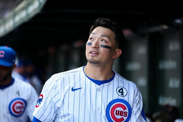 Chicago Cubs' Seiya Suzuki (27) sings "Go Cubs Go" after the Chicago Cubs defeated the Cincinnati Reds 7-3 at Wrigley Field on Sunday, June 1, 2025. (Eileen T. Meslar/Chicago Tribune)