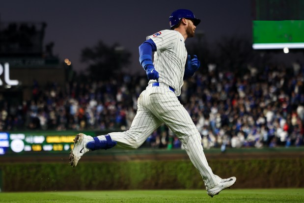 Cubs catcher Carson Kelly rounds the bases after homering against the Giants on Monday, May 5, 2025, at Wrigley Field. (Audrey Richardson/Chicago Tribune)