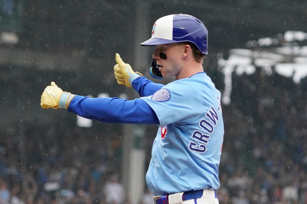 The Cubs' Pete Crow-Armstrong gestures after hitting a single against the Pirates during the sixth inning Friday, June 13, 2025, at Wrigley Field. (AP Photo/David Banks)