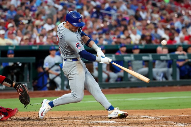 The Cubs' Nico Hoerner hits a two-run home run during the sixth inning against the Cardinals on June 24, 2025, in St. Louis. (Scott Kane/Getty Images)