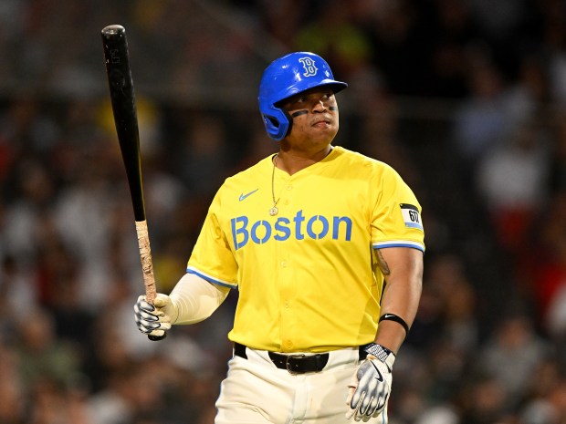 Rafael Devers of the Red Sox walks off the field after striking out against the Yankees on Saturday, June 14, 2025, at Fenway Park in Boston. (Brian Fluharty/Getty Images)
