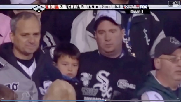 An image from MLB video shows the Rev. Robert Prevost, now Pope Leo XIV, left, on the broadcast during Game 1 of the 2005 World Series between the Astros and White Sox at U.S. Cellular Field, in Chicago, on Oct 22, 2005. (MLB)