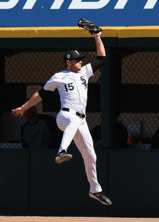 White Sox right fielder Austin Slater leaps to catch what would have been a home run by Giants center fielder Jung Hoo Lee in the second inning Saturday, June 28, 2025, at Rate Field. (John J. Kim/Chicago Tribune)