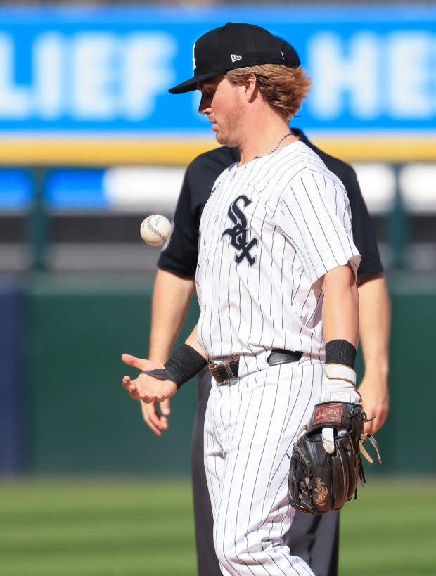 White Sox second baseman Chase Meidroth bounces a ball off his chest after an out in the seventh inning against the Giants on Saturday, June 28, 2025, at Rate Field. (John J. Kim/Chicago Tribune)