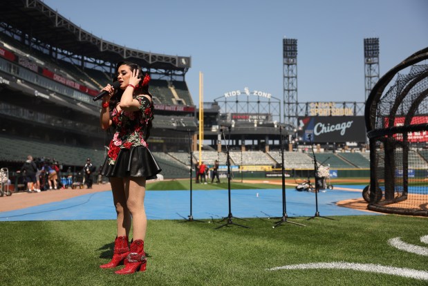 Angelina Victoria rehearses the national anthem before a White Sox-Royals game on Mexican Heritage Night at Rate Field on June 6, 2025. (John J. Kim/Chicago Tribune)