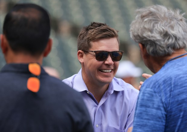 White Sox general manager Chris Getz talks with a Royals staff member before a game on June 6, 2025, at Rate Field. (John J. Kim/Chicago Tribune)