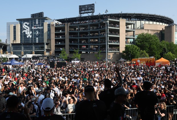 Fans watch Eskandalozza Banda Viento perform before a White Sox-Royals game on Mexican Heritage Night at Rate Field on June 6, 2025, in Chicago. (John J. Kim/Chicago Tribune)