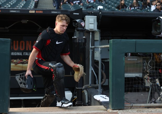 White Sox catcher Kyle Teel heads to the bullpen to warm up before a game against the Royals at Rate Field on June 6, 2025, in Chicago. Teel made his major-league debut in the game. (John J. Kim/Chicago Tribune)