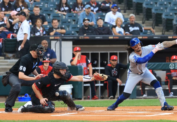 White Sox catcher Kyle Teel, making his major-league debut, takes a foul ball to the gut from Royals second baseman Jonathan India in the first inning at Rate Field on June 6, 2025, in Chicago. (John J. Kim/Chicago Tribune)