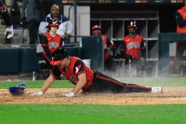 White Sox catcher Kyle Teel celebrates at the plate to score on a wild pitch in the eighth inning against the Royals at Rate Field on June 6, 2025, in Chicago. (John J. Kim/Chicago Tribune)