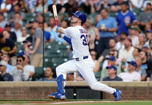 Cubs right fielder Kyle Tucker follows through on a double in the first inning against the Brewers on Tuesday, June 17, 2025, at Wrigley Field. (Chris Sweda/Chicago Tribune)