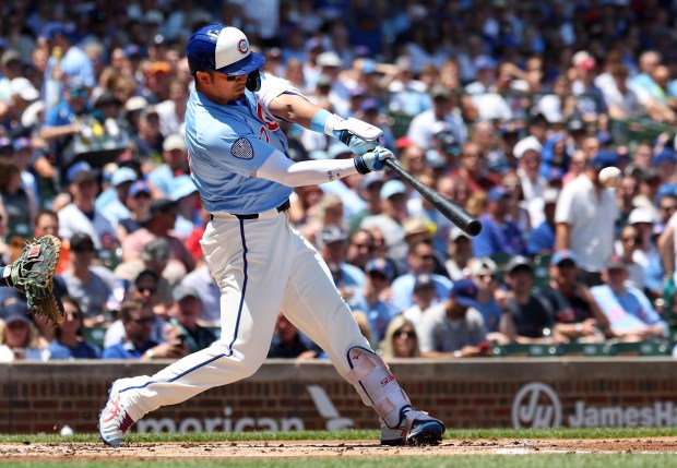 Cubs designated hitter Seiya Suzuki doubles in the first inning against the Mariners on Friday, June 20, 2025, at Wrigley Field. (Chris Sweda/Chicago Tribune)