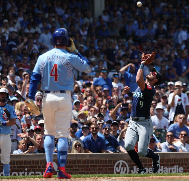 Mariners third baseman Ben Williamson catches a foul popup from Cubs center fielder Pete Crow-Armstrong in the third inning on Friday, June 20, 2025, at Wrigley Field. (Chris Sweda/Chicago Tribune)