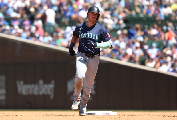 Mariners designated hitter Mitch Garver rounds the bases after hitting a two-run home run in the sixth inning against the Cubs on Friday, June 20, 2025, at Wrigley Field. (Chris Sweda/Chicago Tribune)