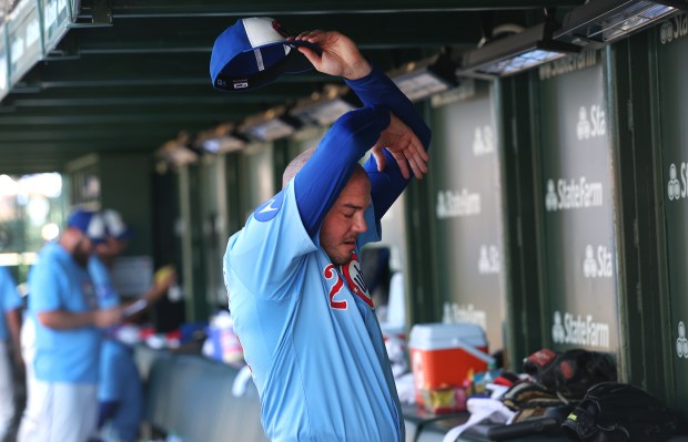 Cubs reliever Caleb Thielbar stands in the dugout after being pulled from the game in the seventh inning against the Mariners on Friday, June 20, 2025, at Wrigley Field. (Chris Sweda/Chicago Tribune)