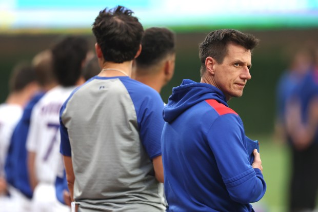 Cubs manager Craig Counsell stands for the national anthem before a game against the Pirates on June 12, 2025, at Wrigley Field. (Chris Sweda/Chicago Tribune)