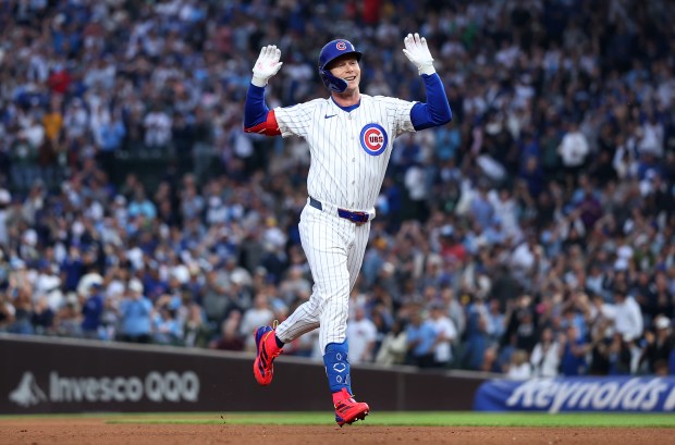 Cubs center fielder Pete Crow-Armstrong celebrates as he rounds the bases after hitting a two-run home run in the fourth inning against the Pirates on June 12, 2025, at Wrigley Field. (Chris Sweda/Chicago Tribune)