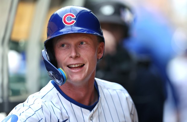 Cubs center fielder Pete Crow-Armstrong flashes a smile in the dugout after hitting a two-run home run in the fourth inning against the Pirates on June 12, 2025, at Wrigley Field. (Chris Sweda/Chicago Tribune)