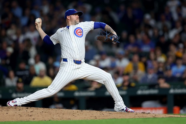 Chicago Cubs relief pitcher Ryan Pressly delivers to the Pittsburgh Pirates in the ninth inning of a game at Wrigley Field in Chicago on June 12, 2025. (Chris Sweda/Chicago Tribune)