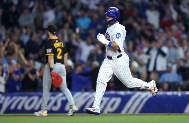 Cubs designated hitter Seiya Suzuki rounds the bases after hitting a solo home run in the sixth inning against the Pirates on June 12, 2025, at Wrigley Field. (Chris Sweda/Chicago Tribune)