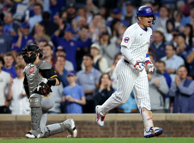 Cubs designated hitter Seiya Suzuki celebrates after crossing the plate following his solo home run in the sixth inning against the Pirates on June 12, 2025, at Wrigley Field. (Chris Sweda/Chicago Tribune)