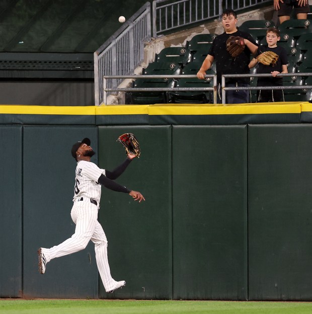 Chicago White Sox center fielder Luis Robert Jr. tracks down a long fly ball that went for a sacrifice fly for the Arizona Diamondbacks in the seventh inning of a game at Rate Field in Chicago on June 24, 2025. (Chris Sweda/Chicago Tribune)