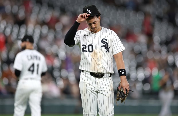 Chicago White Sox third baseman Miguel Vargas (20) puts his hat back on after grounding into a double play to end the eighth inning of a game against the Arizona Diamondbacks at Rate Field in Chicago on June 24, 2025. (Chris Sweda/Chicago Tribune)