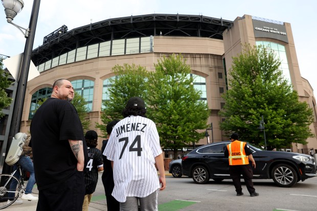 Chicago White Sox fans arrive at Rate Field in Chicago before a game between the Sox and the Detroit Tigers on June 3, 2025. (Chris Sweda/Chicago Tribune)