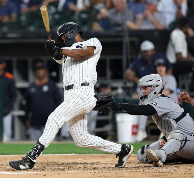 Chicago White Sox center fielder Michael A. Taylor hits a three-run home run in the sixth inning of a game against the Detroit Tigers at Rate Field in Chicago on June 3, 2025. (Chris Sweda/Chicago Tribune)