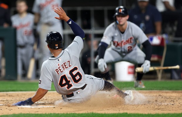Detroit Tigers right fielder Wenceel Pérez (46) slides in safely at home plate while scoring in the seventh inning of a game against the Chicago White Sox at Rate Field in Chicago on June 3, 2025. (Chris Sweda/Chicago Tribune)