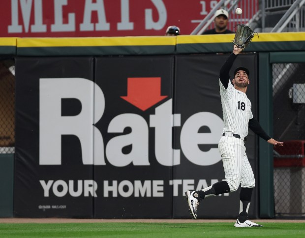 Chicago White Sox right fielder Mike Tauchman (18) catches a deep fly ball in the eighth inning of a game against the Detroit Tigers at Rate Field in Chicago on June 3, 2025. (Chris Sweda/Chicago Tribune)