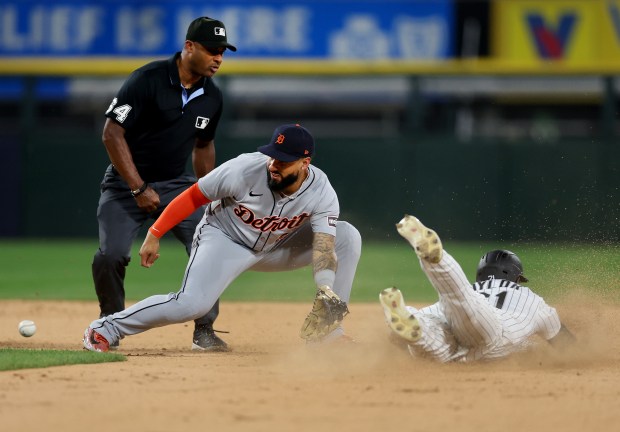 Detroit Tigers second baseman Gleyber Torres receives a late throw as Chicago White Sox outfielder Michael A. Taylor steals second base in the eighth inning of a game at Rate Field in Chicago on June 3, 2025. (Chris Sweda/Chicago Tribune)
