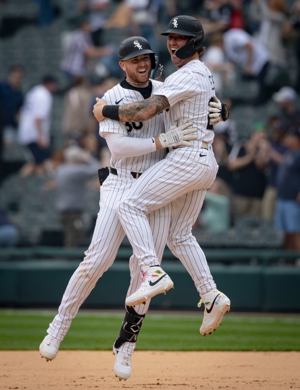 White Sox first baseman Tim Elko, left, celebrates his game-winning hit with catcher Korey Lee to defeat the Tigers 3-2 in 10 innings on June 5, 2025, at Rate Field. (Brian Cassella/Chicago Tribune)