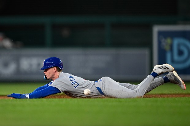 Chicago Cubs' Pete Crow-Armstrong beat the throw from Washington Nationals catcher Keibert Ruiz and steals second base during the sixth inning of a baseball game in Washington, Tuesday, June 3, 2025. (AP Photo/Terrance Williams)