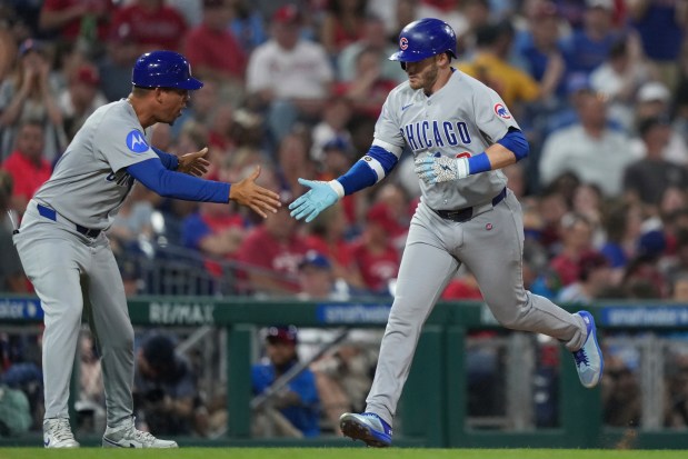 Chicago Cubs' Ian Happ reacts after a home run during a baseball game Tuesday, June 10, 2025, in Philadelphia. (AP Photo/Matt Slocum)