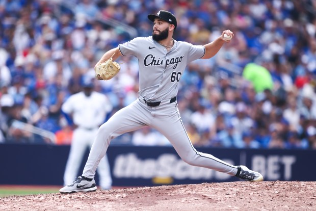 White Sox reliever Jake Palisch, making his major-league debut, delivers against the Blue Jays in the eighth inning on June 21, 2025, in Toronto. (Cole Burston/Getty Images)