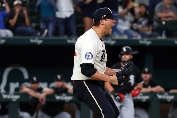 Reliever Robert Garcia yells after striking out White Sox left fielder Michael A. Taylor for the final out in the ninth inning of the Rangers' 3-1 victory on June 13, 2025 in Arlington, Texas. (Richard Rodriguez/Getty Images)