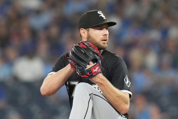 Chicago White Sox pitcher Adrian Houser works against Toronto Blue Jays during the first inning of a baseball game in Toronto, Sunday June 22, 2025. (Chris Young/The Canadian Press via AP)