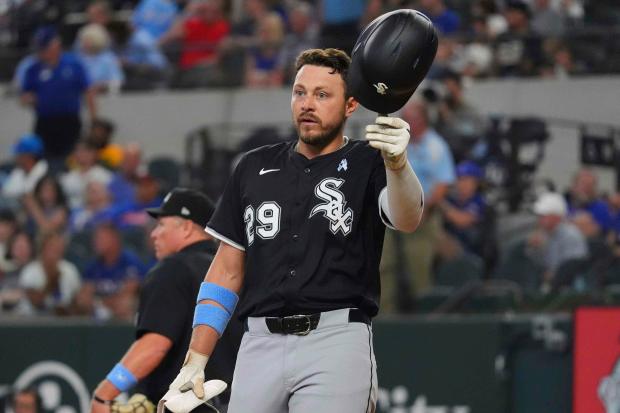 Chicago White Sox's Ryan Noda tosses his helmet after striking out during the fourth inning of a baseball game against the Texas Rangers, Sunday, June 15, 2025, in Arlington, Texas. (AP Photo/LM Otero)