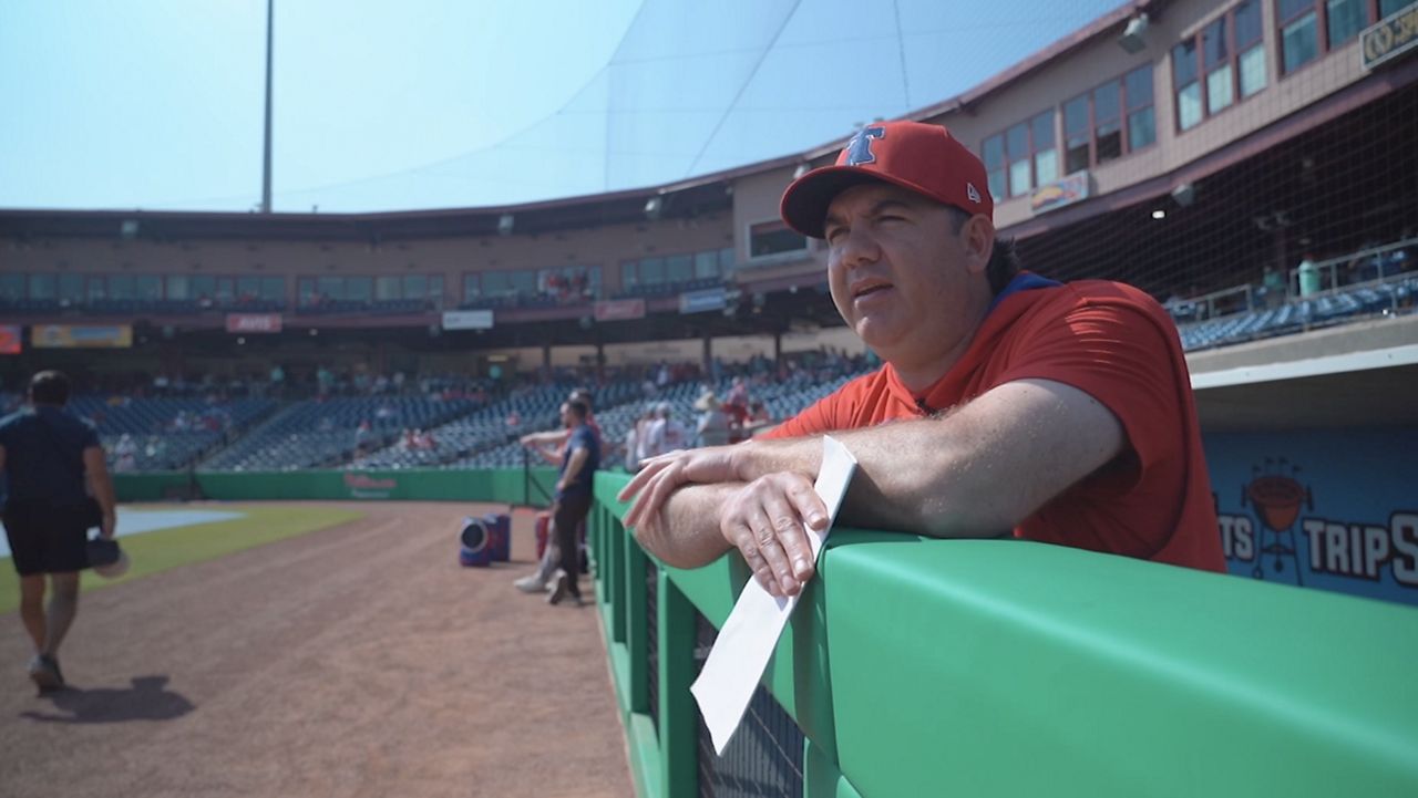 Mike Calitri balances roles as Phillies bench coach and dad